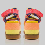 handmade platform sandal in vibrant orange, yellow, and red with adjustable straps pair from back
