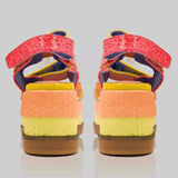 handmade platform sandal in vibrant orange, yellow, and red with adjustable straps pair from back
