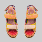 handmade platform sandal in vibrant orange, yellow, and red with adjustable straps pair from top