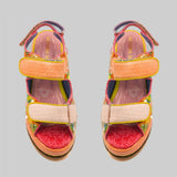 handmade platform sandal in vibrant orange, yellow, and red with adjustable straps pair from top