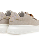 beige suede like platform sneaker with laces and bejeweled butterfly jewelry pair from back
