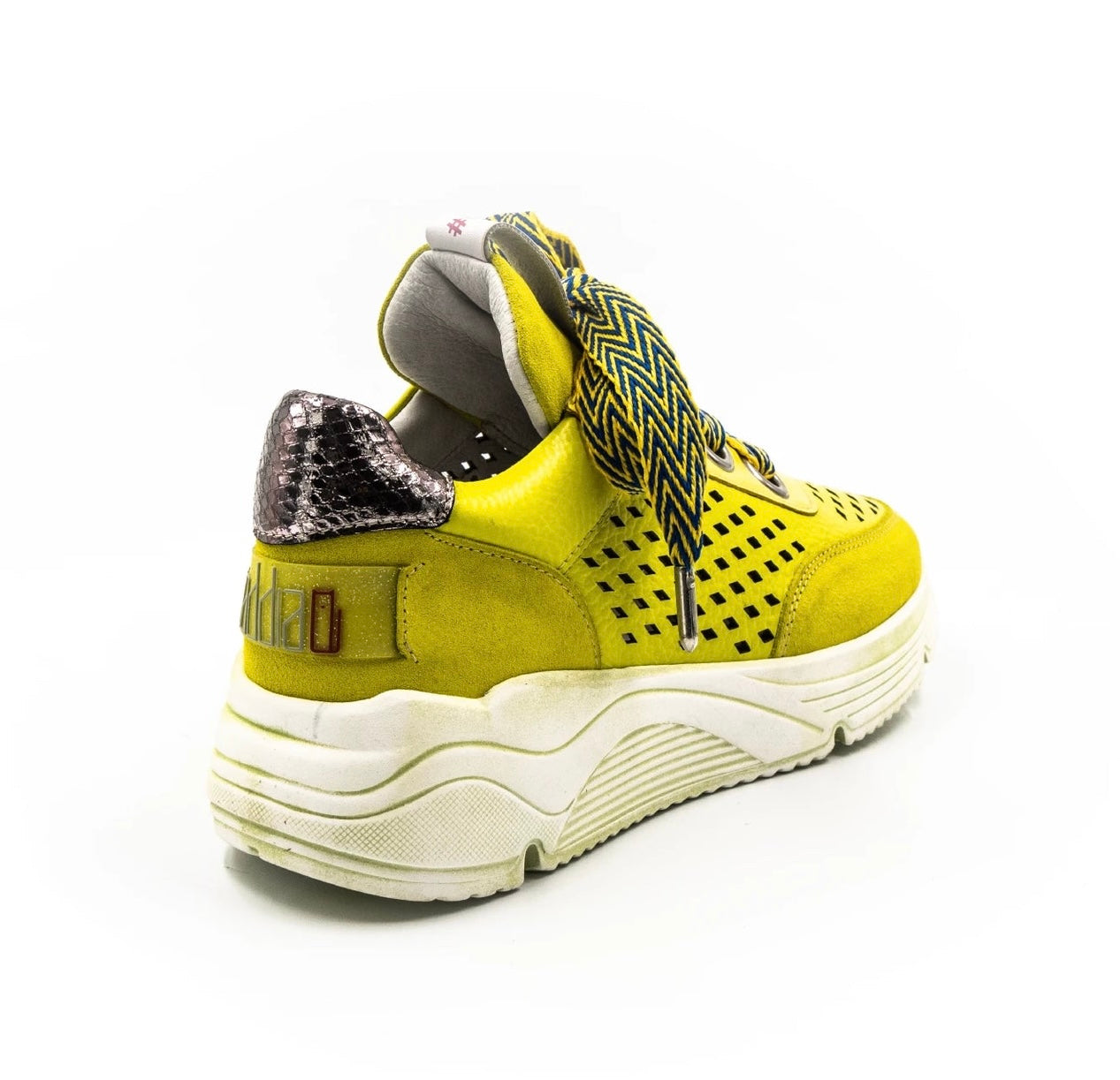 neon colored perforated platform sneaker with metallic back detail and patterned laces back view