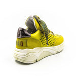 neon colored perforated platform sneaker with metallic back detail and patterned laces back view