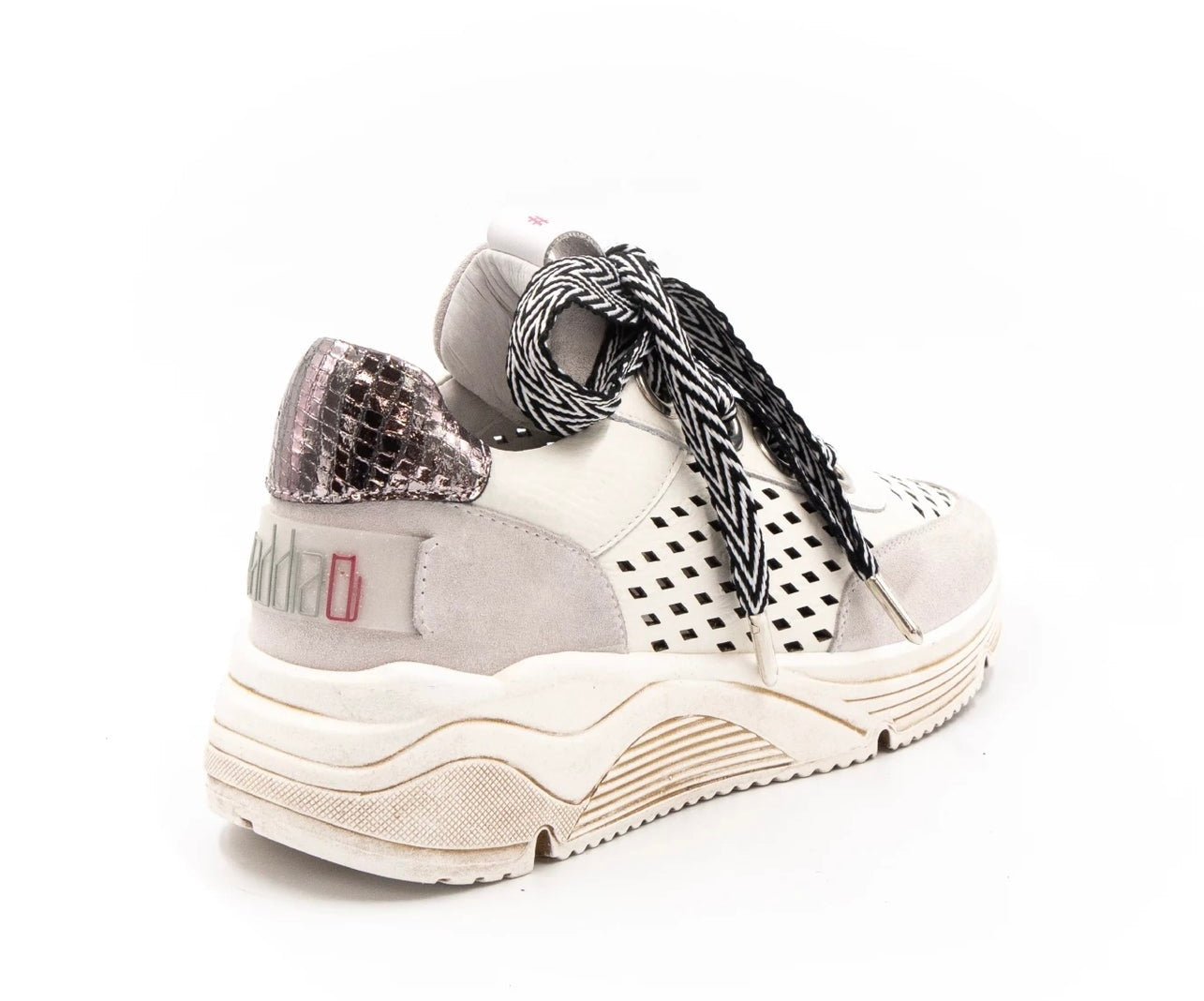 neutral colored perforated platform sneaker with metallic detail backing and patterned laces back side profile