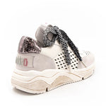 neutral colored perforated platform sneaker with metallic detail backing and patterned laces back side profile