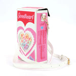 Heart shaped candy inspired novelty handbag made from quality vinyl material side profile