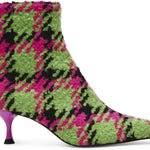 pink, green, and black houndstooth inspired kitten heel bootie by Betsey Johnson with side zipper close up of pattern detail