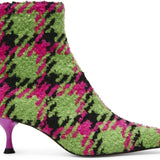pink, green, and black houndstooth inspired kitten heel bootie by Betsey Johnson with side zipper close up of pattern detail
