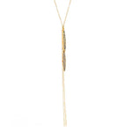 double crystal leaf necklace features an 18K gold finish with black diamond crystal accents on a 16" chain with lobster clasp closure. Handmade in New York.