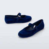 Melissa Soft Ballerina Velvet flat in deep blue. This classic women's ballet flat features a flocked finish, mimicking velvet, a fun bubblegum scent, adjustable buckle strap, an rounded toe front back pair