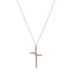 small interlocked crystal cross necklace features 18K gold finish with black diamond crystal accents on a 16" brass chain with lobster clasp closure. Handmade in New York.