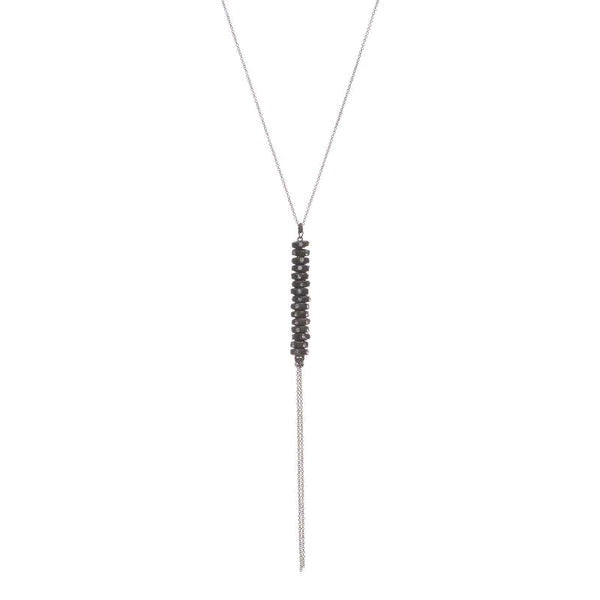 crystal stacked necklace features an antique brass finish with black diamond crystal accents on a 16" delicate chain with lobster clasp closure. Handmade in New York.