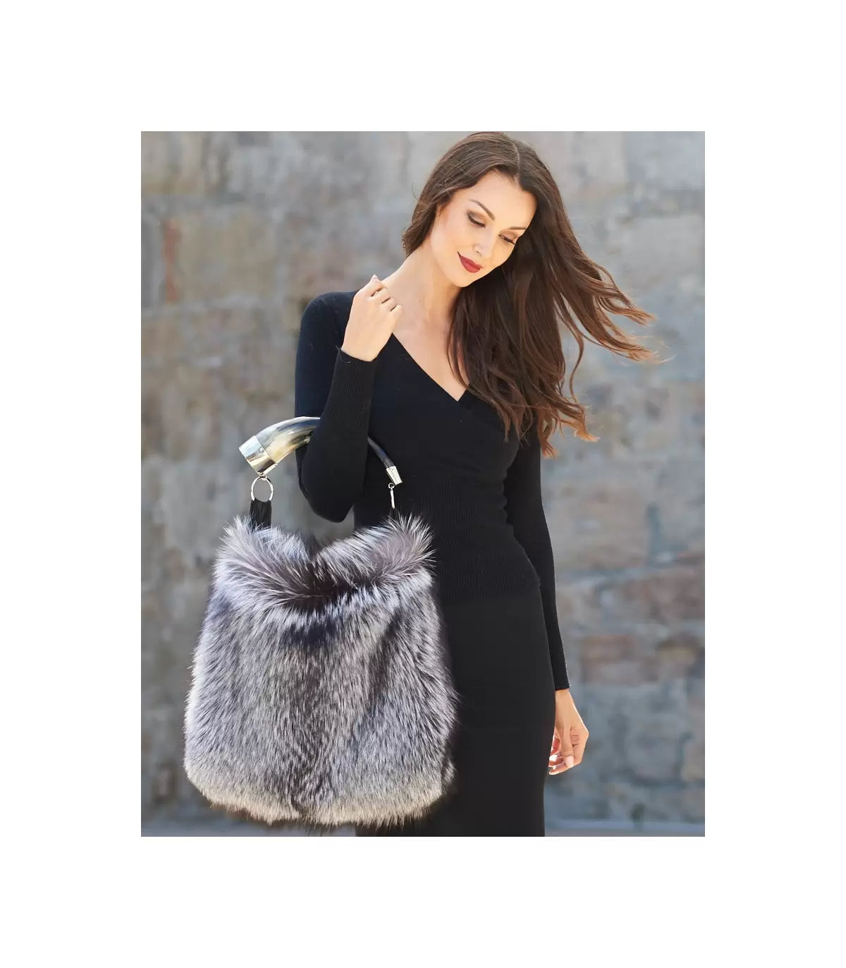 Genuine silver black fox fur handbag with cow horn handle. Made in the USA. Full feature on model.