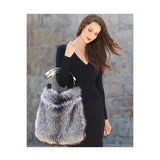 Genuine silver black fox fur handbag with cow horn handle. Made in the USA. Full feature on model.