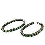 burnished oval hoop earrings features an antique brass finish with semi precious stones. Handmade in Brooklyn