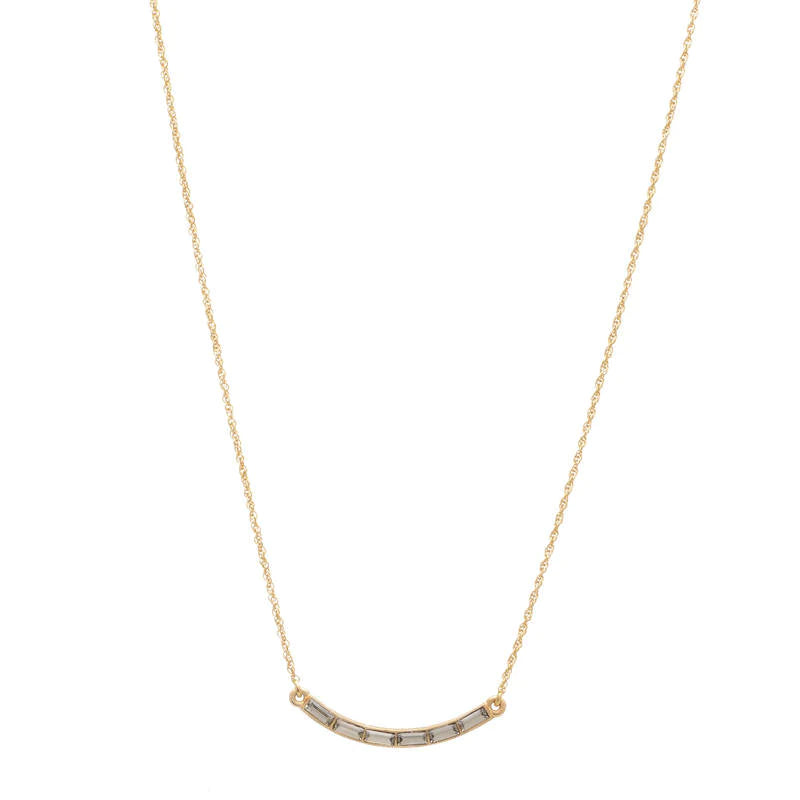 curved bar necklace with baguette crystals features 18K gold finish with Austrian crystal accents on a 16" chain with lobster clasp closure. Handcrafted in Brooklyn.