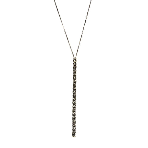 crystal stacked Y necklace features an antique brass finish with black diamond crystals accents. This necklace has a 36" chain. Handmade in New York.
