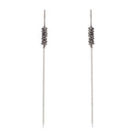 small stacked earrings with brass chain feature antique brass finish with black diamond crystals. Handmade in New York.