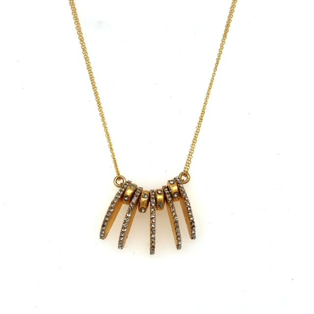 funky accent necklace features 18K gold plating over brass with black diamond accents. Handmade in New York.