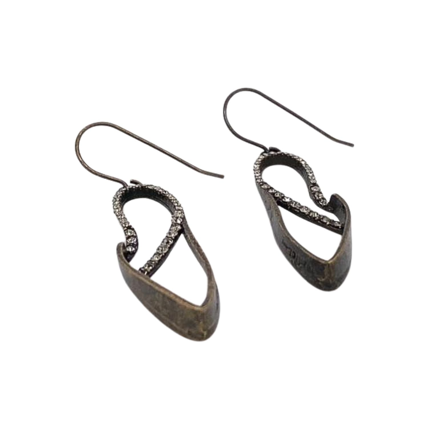 drop earrings feature antique brass and black diamond crystal detail. Handcrafted in New York.