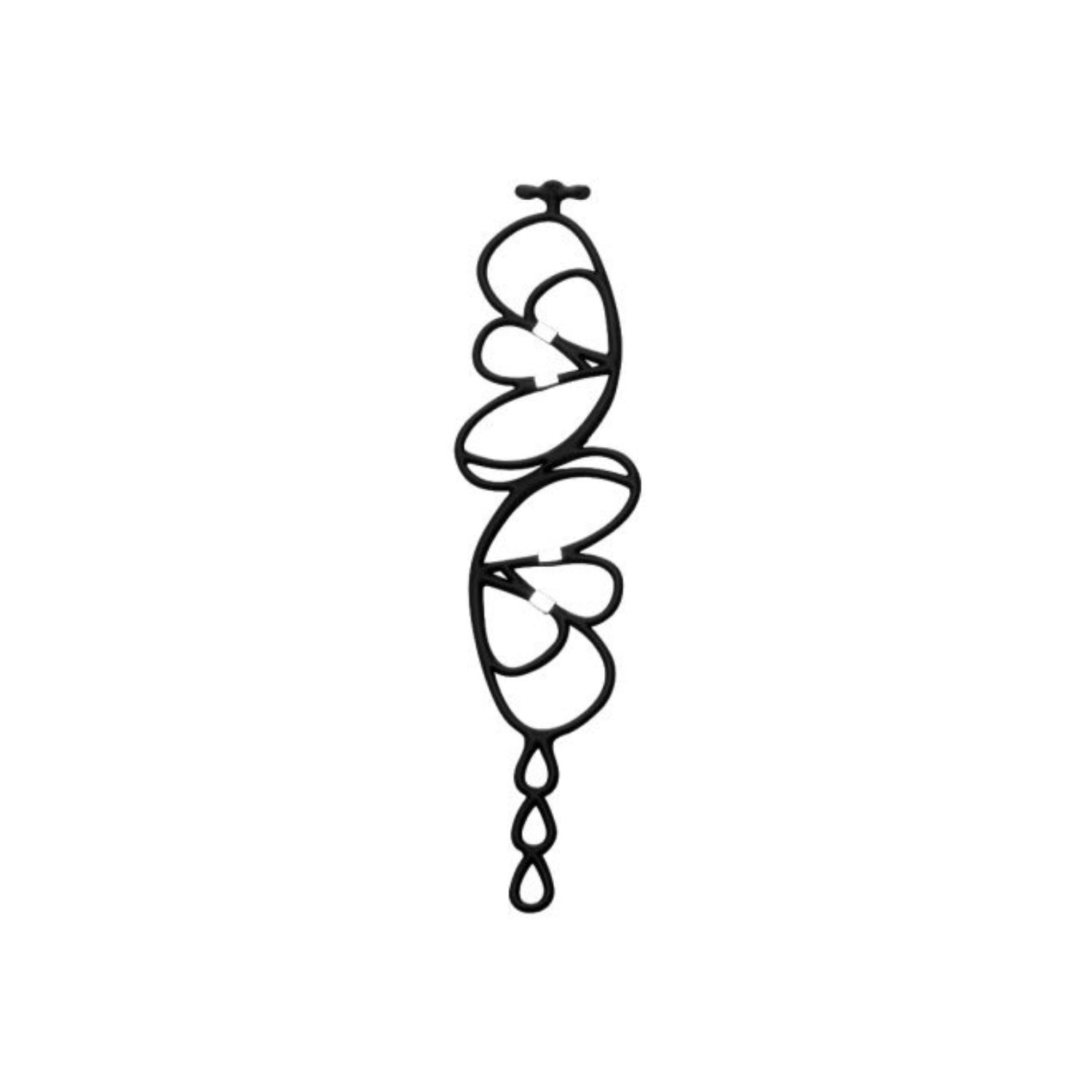 Ce Soir bracelet by Batucada combines delicate sexy curves with silver accent pieces for a subtle and sophisticated look that complements and enhances your femininity.