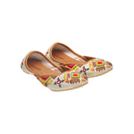 canvas flats with beaded detail inspired by tribal patterns and colors