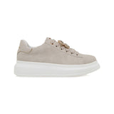 beige suede like platform sneaker with laces and bejeweled butterfly jewelry