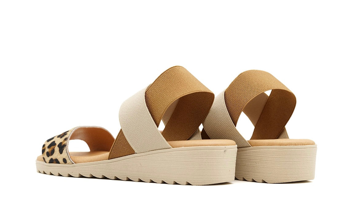 Beige sandal with leopard print strap heel view