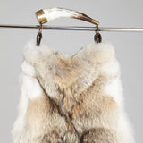 Genuine coyote fur handbag with cow horn handle. Made in the USA. Ranch raised.
