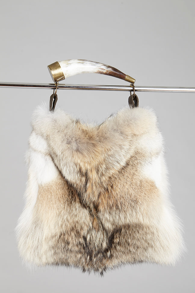 Genuine coyote fur handbag with cow horn handle. Made in the USA. Ranch raised.