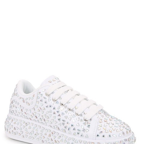 white sneaker with triangle silver detail and white laces 