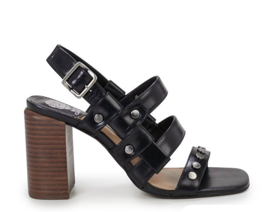 Black chunky strapped heeled sandal made of luxe soft nubuck leather embellished with flat studs. Has adjustable slingback strap close up.