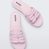 powder pink slide flat sandal pair