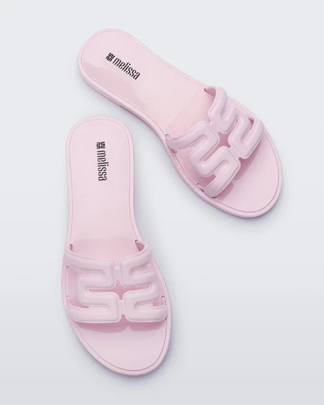 powder pink slide flat sandal pair