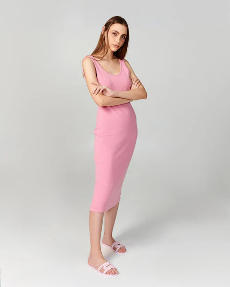 powder pink slide flat sandal pair on model