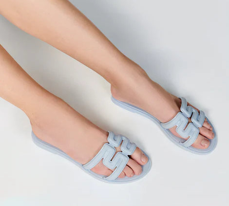 powder blue slide flat sandal on model