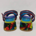 multi-colored strappy low heel sandal pair back