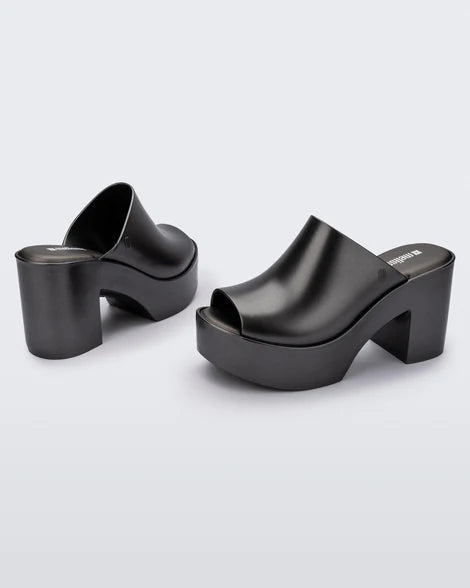 black colored bubblegum scented heeled mule slip on sandal pair