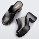 black colored bubblegum scented heeled mule slip on sandal birds eye view