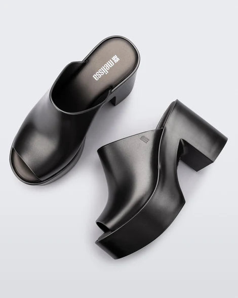 black colored bubblegum scented heeled mule slip on sandal birds eye view