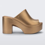 gold colored bubblegum scented heeled mule slip on sandal profile