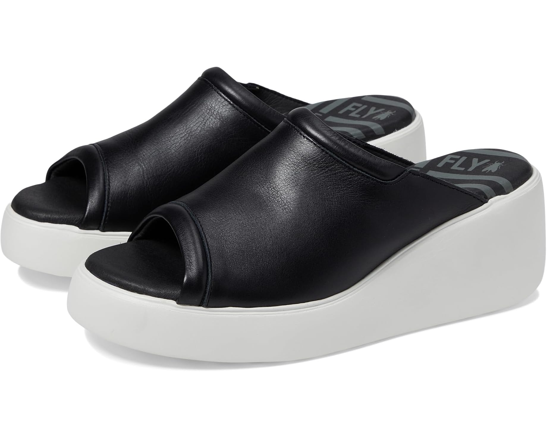 black and white slip on wedge sandal pair