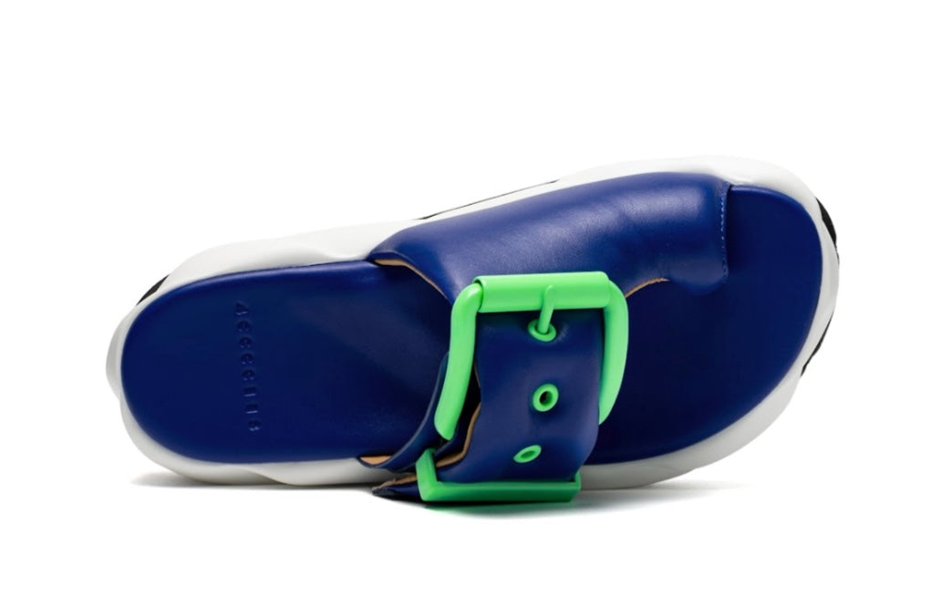 blue, green. white, and black puffy strap platform slip on sandal top