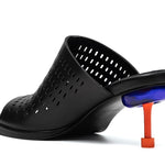 perforated black leather sandal with red and blue architectural heel back