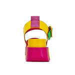yellow pink and green color block platform sandal with buckle strap back