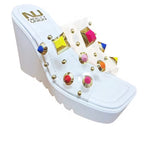 white platform wedge slip on sandal with multi-colored jewel side
