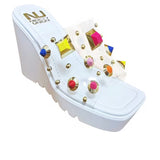 white platform wedge slip on sandal with multi-colored jewel side