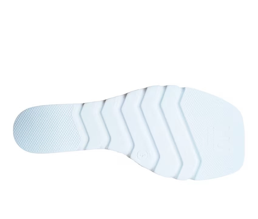 white platform wedge slip on sandal with multi-colored jewel bottom