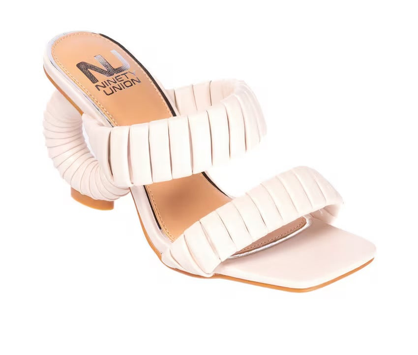 cream colored square open toe sling back heel sandals with open circular heel and padded footbed profile view