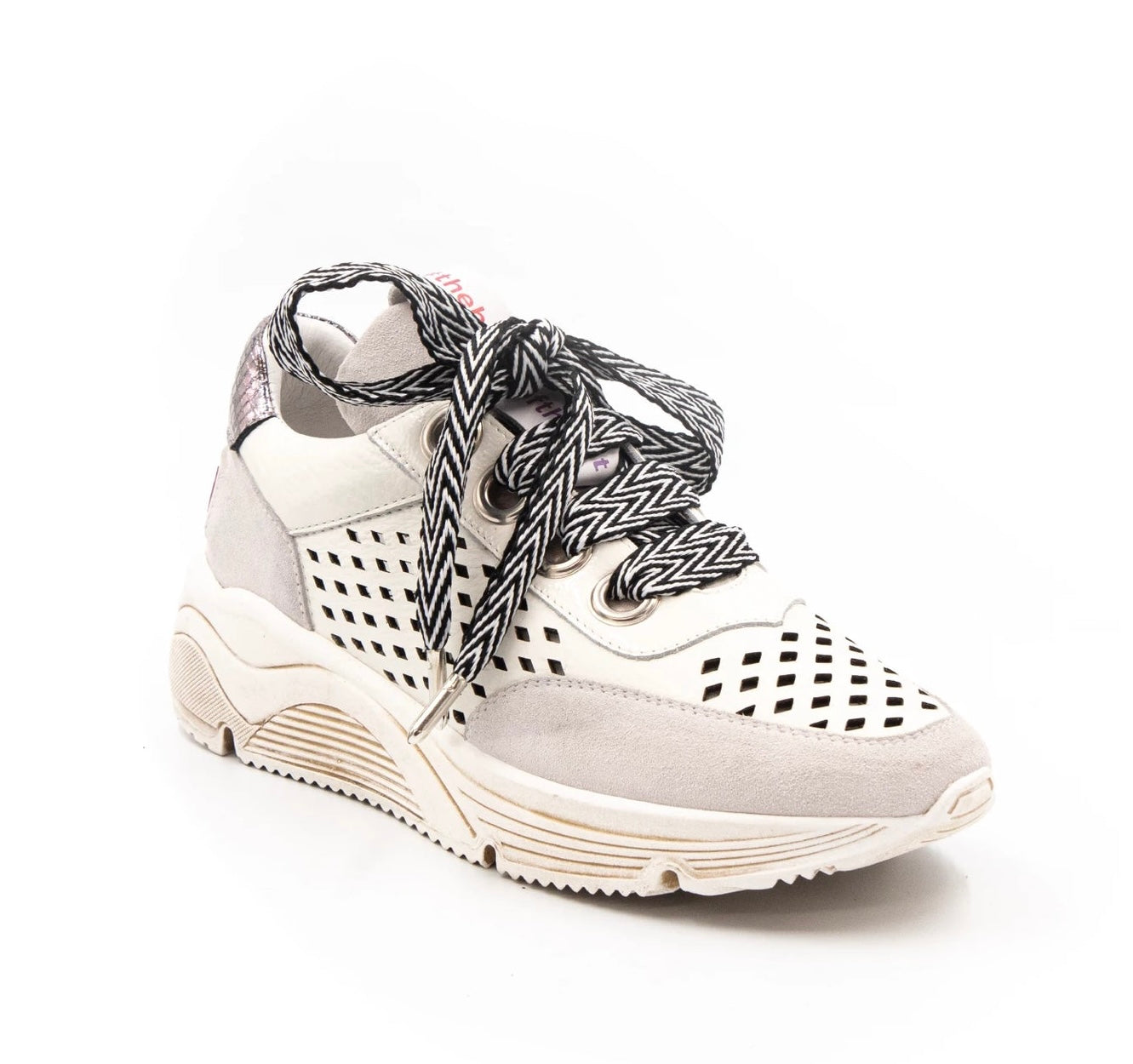 neutral colored perforated platform sneaker with metallic detail backing and patterned laces side profile